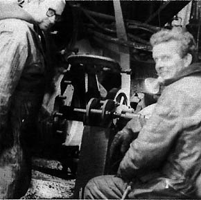 Bruce Bergman, right, and Ed Beard, left, running the boring bar