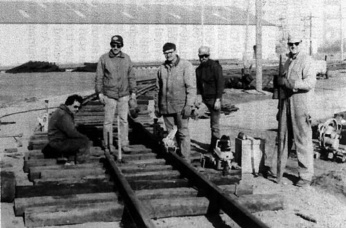 The track crew poses for pictures