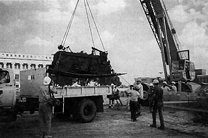 The crew loads the 503 on a Museum dump truck